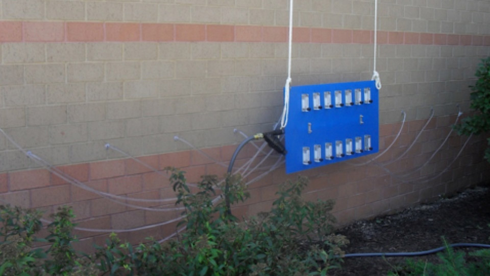 Masonry cavity drainage testing in progress. Masonry cavity drainage testing in progress.
